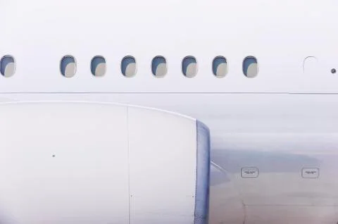 Engine and windows on airplane Stock Photos