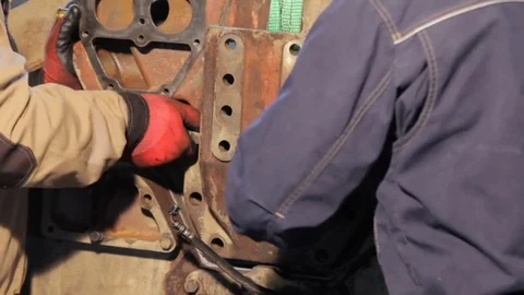 Engine assembly manual. Assembly of diesel truck engine. spinning the bolt by 스톡 동영상 78254740