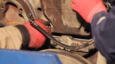 Engine assembly manual. Assembly of diesel truck engine. spinning the bolt by 動画素材 78254822