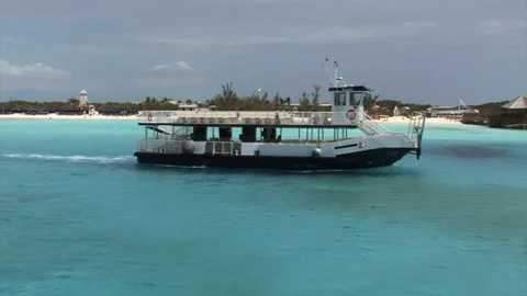 Engine boat and Half Moon Cay island, Bahamas Stock Footage 151658888