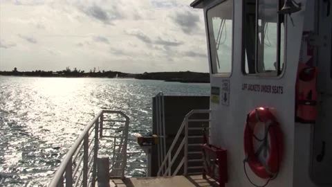 Engine boat getting close to Half Moon Cay island, Bahamas Stock Footage 151658886