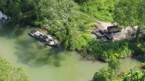 Engine boats transporting sand around the river in the waters of the forest.. Stock Footage 253637188