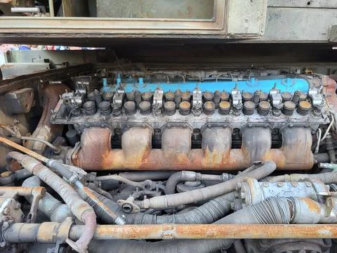 An engine in a burnt Russian tank. Stock Photos