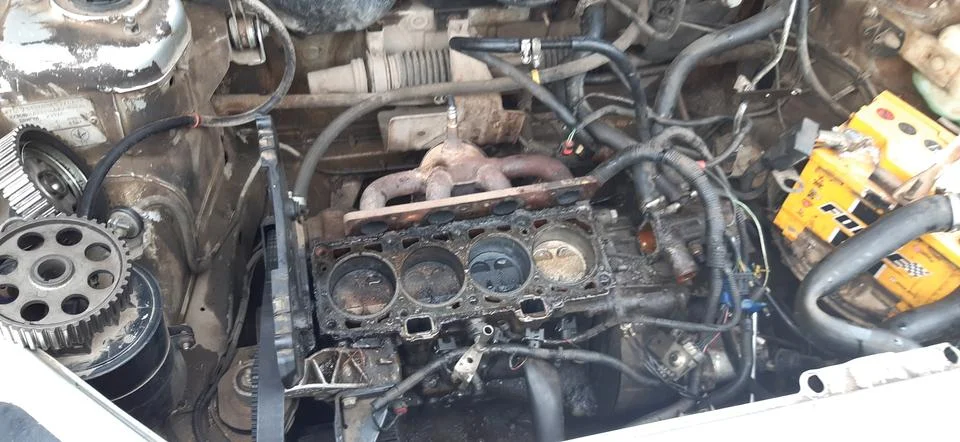 The engine of the car is disassembled Stock Photos