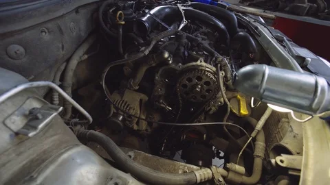 Engine compartment of auto, closeup detailed view of engine, open hood Stock Footage 95094692
