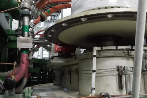 The engine compartment of the ship. Engine and steering equipment. Stock Photos