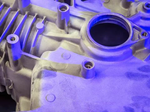 Engine component under ultraviolet light reveals intricate details and text.. 写真素材