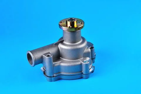 Engine cooling pump, engine coolant pump for truck, blue background Stock Photos