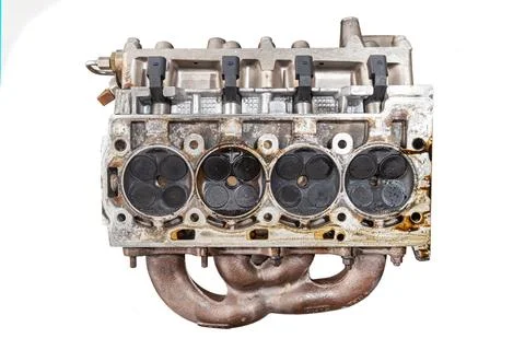 Engine cylinder head isolated on white background, engine repair Stock Photos