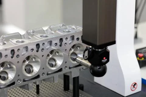 Engine dimensions inspecting on bridge CMM machine Stock Photos