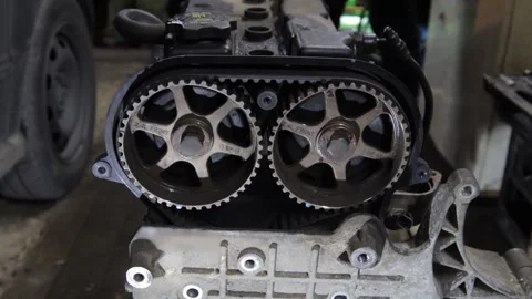 Engine gas distribution system, camshafts for a timing belt in a car. Video stock 249351722