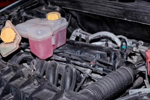 The engine of a gasoline car that is being repaired in the workshop Stock Photos