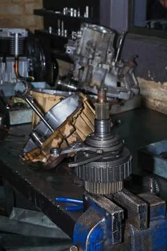Engine Gear Assembly On Workshop Bench Vice Stock Photos
