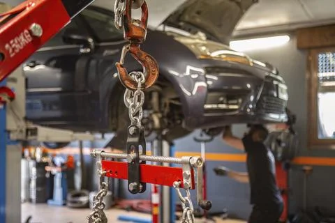 Engine Hoist Chain Detail in Workshop Stock Photos