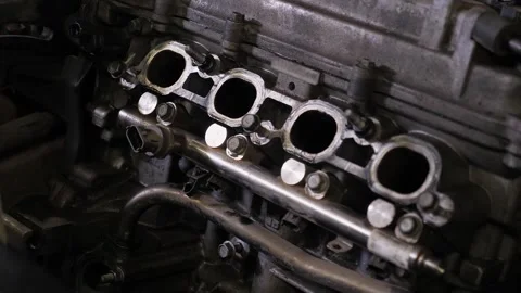The engine in the hood of the car, car maintenance in the service center. Stock Footage 341316555