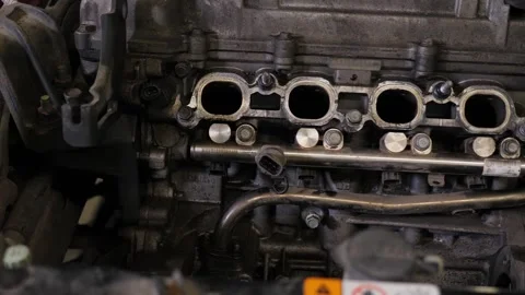 The engine in the hood of the car, car maintenance in the service center. Stock Footage 341550902