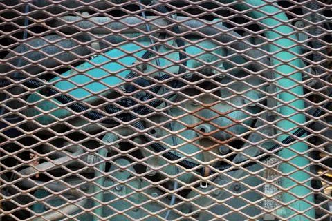 Engine machine construction equipment front grid heavy metal background Stock Photos