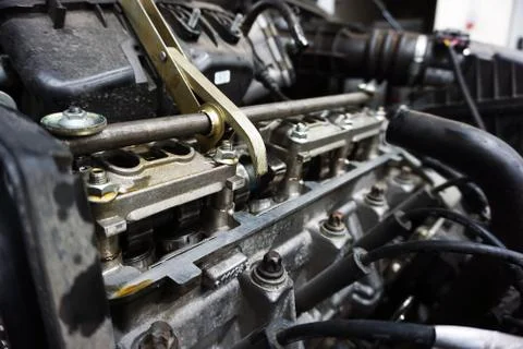 The engine of a modern car during repairs. Stock-Fotos