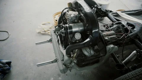 Engine, motor on auto-disassembly in garage Stock Footage 86338298