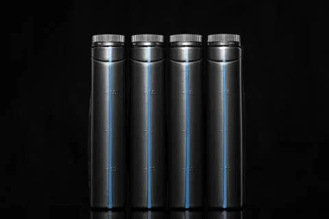 Engine oil bottle on black background, close up. 스톡 사진