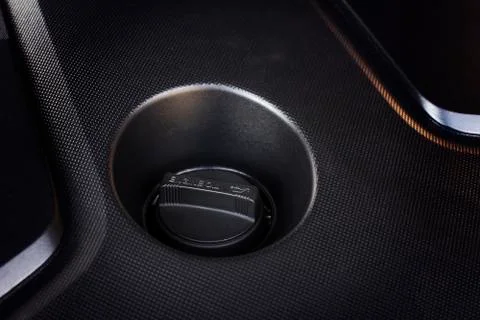 Engine oil cap installed on a car engine. Stock Photos
