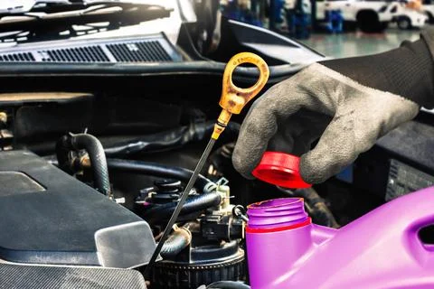 Engine oil change , Checking engine oil level in vehicle maintenance 스톡 사진