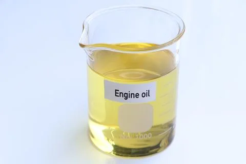 Engine oil in container, science experiment concept Фото