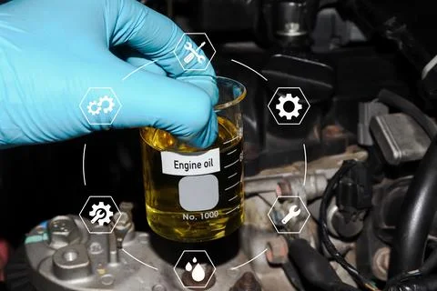 Engine oil in container, science experiment concept Foto stock