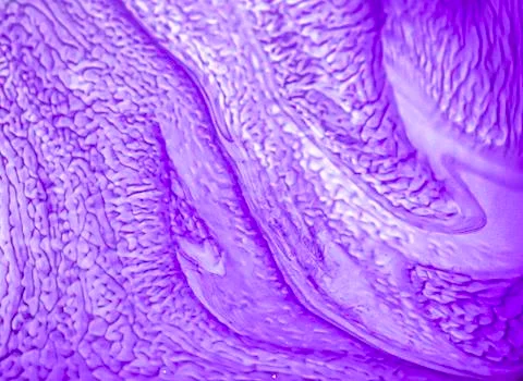 Engine oil that has been changed and mixed with water creates beautiful patte Stock Photos