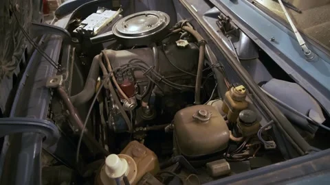 The engine of an old car. View under the hood Stock Footage 163718924