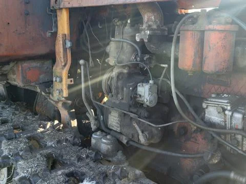 Engine on an old tractor on a bright Sunny day. Light, blur Foto stock