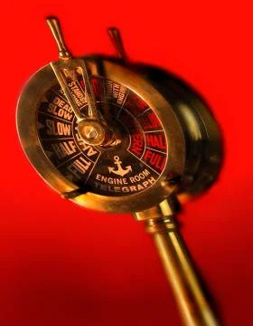 ENGINE ORDER TELEGRAPH AGAINST RED BACKGROUND Foto stock