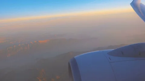 Engine of a Plane and Alps Mountains at Sunset Video stock 72144517