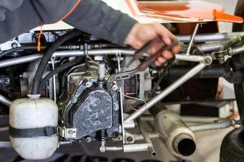 Engine repair close up. In hands tool. Stock Photos