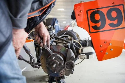 Engine repair close up. In hands tool. Stock Photos