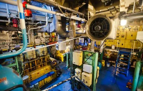 Engine Room on a cargo boat ship interior, ship's engine heavy Machinery Spac Fotos de archivo