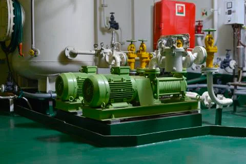 Engine room interior of a big ocean going ship Stock Photos
