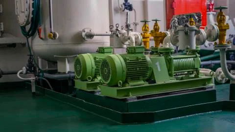 Engine room interior of a big ocean going ship Stock Photos