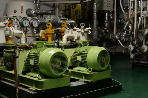 Engine room interior of a big ocean going ship Stock Photos