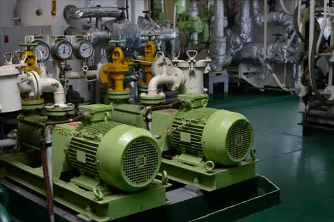 Engine room interior of a big ocean going ship Stock Photos