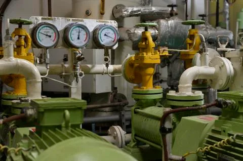 Engine room interior of a big ocean going ship Stock Photos