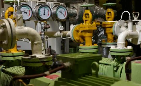 Engine room interior of a big ocean going ship Stock Photos
