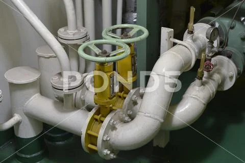 Engine room interior of a big ocean going ship ~ Premium Photo #127281349