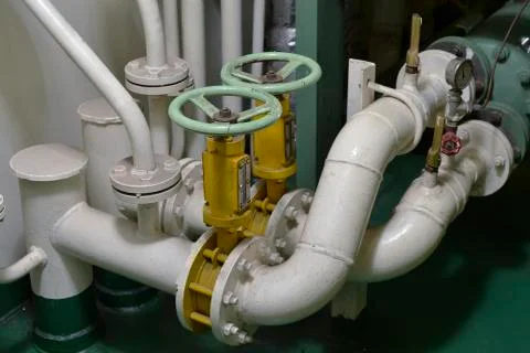 Engine room interior of a big ocean going ship Stock Photos