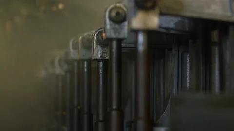 Engine room interior with close up of gauge followed by an engine push rods Stock Footage 202909767