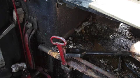 Engine room of an old German steam train locomotive interior, coal and shovel Vídeos de archivo 61918930