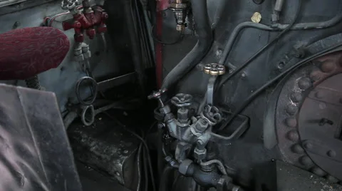 Engine room of an old train steam engine locomotive interior with vintage gear Stock Footage 61919381