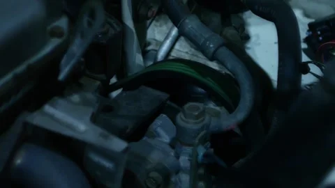 The engine is running the engine belt is rotating Stock Footage 256161294