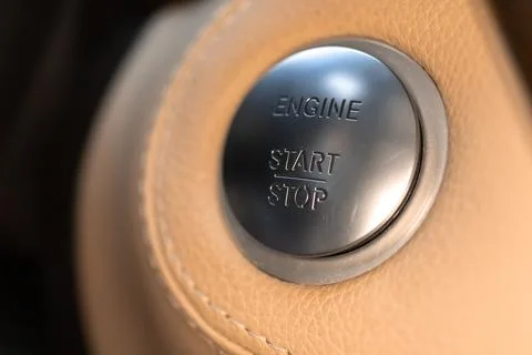 Engine start and stop button in luxury sport car close-up view Foto stock
