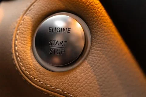 Engine start and stop button in luxury sport car close-up view Foto stock